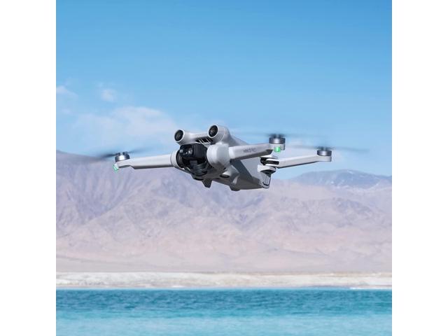 DJI Mini 3 Pro (DJI RC) - Lightweight and Foldable 34-min Flight Time Camera Drone Bundle with Built in Monitor, with 128 GB SD Card, 3.0 USB Card Reader, Landing Pad, Waterproof Backpack and More